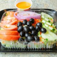 House Salad · Iceberg lettuce with fresh mushrooms, celery, carrots, cucumber, red onions, black olives an...