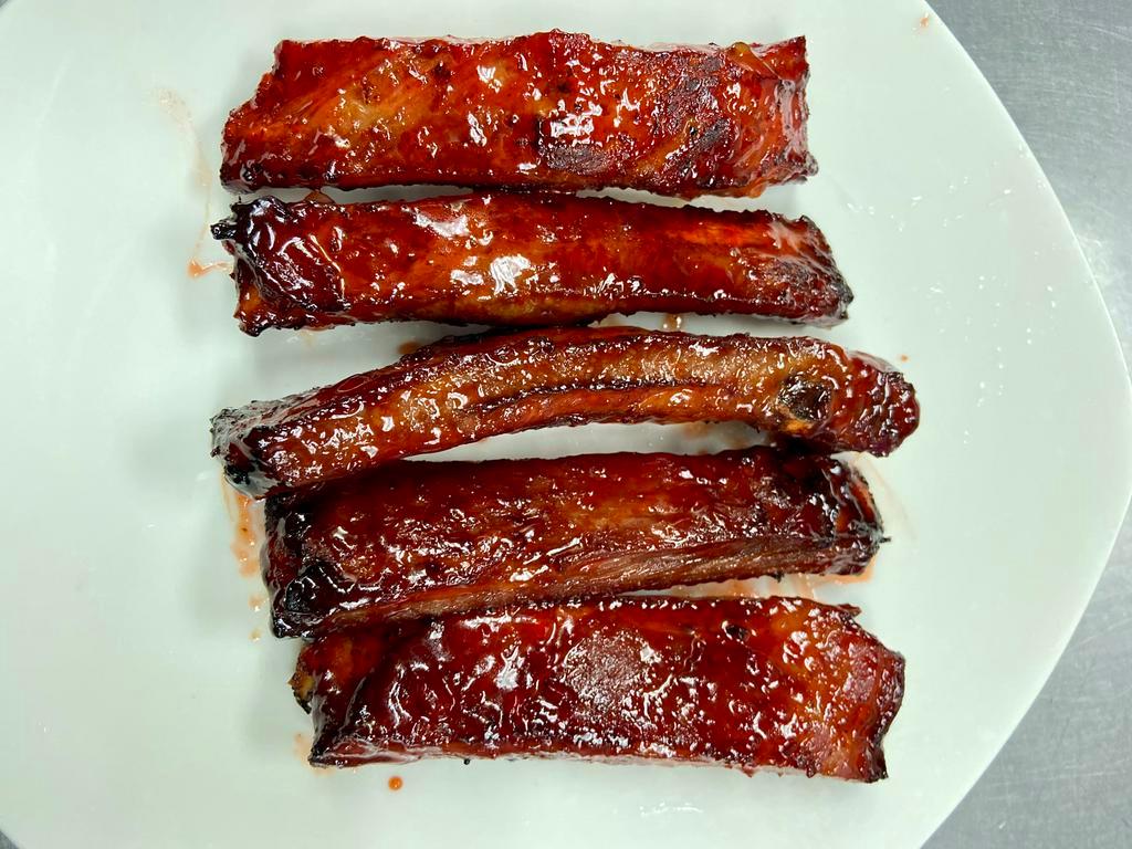 18. BBQ Spare Ribs · Small(4)  Large(8)
Ribs that have been broiled, roasted, or grilled. 