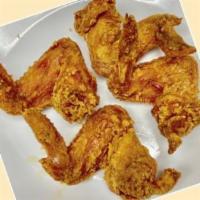 20. Fried Chicken Wings · Cooked wing of a chicken coated in sauce or seasoning.