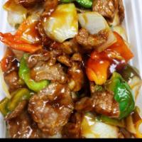 101. Pepper Steak with Onions · Stir fried steak with vegetables and a savory sauce.