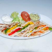 Veggie Quesadilla · Flour tortilla, sauteed bell peppers and onion, cheese guacamole and sour cream.
