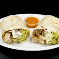 Surf and Turf Burrito · Steak, shrimp, cheese, sour cream, beans, rice and guacamole.
