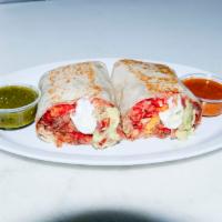 Hot Cheeto Burrito · Choice of meat, rice and beans, hot cheetos, nacho cheese, sour cream and guacamole.
