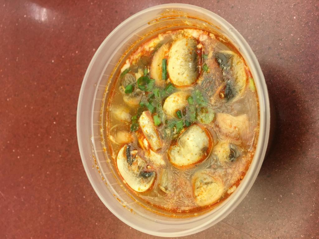 S1. Tom Yum Soup · A light hot and sour broth with mushrooms. Choice of shrimp or chicken or vegetables. Spicy.