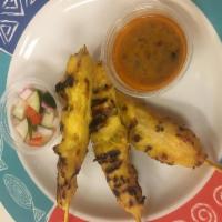 A3. Satay Plate · Skewers of marinated grilled chicken served with house relish and peanut sauce.