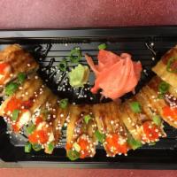 C3. Number 1 Roll · 8 pieces. Deep-fried roll with crab stick, cucumber and cream cheese, topped with eel sauce,...