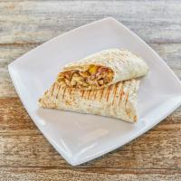 Chicken Shawarma Wrap · Thinly sliced slow roasted chicken, red onion, pickles, lettuce, garlic sauce, and tahini sa...