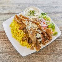 Gyro Platter · Thinly sliced beef and lamb over rice, red onion, pickles, lettuce, feta cheese, tomatoes, t...