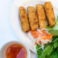 Cha Gio · Crispy spring rolls with shrimp, pork, and vegetable.