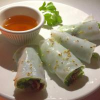 Dinner Thit Cuon · Lemongrass beef roll with sesame seeds and chile-lime sauce.