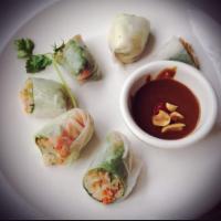Dinner Bo Bia · Vegetarian soft rice paper rolls served with chile bean sauce.