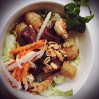 Dinner Omai Salad · Vermicelli salad with shrimp, BBQ pork, spring rolls, and peanuts.