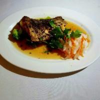 Dinner Ca Chien · Crispy red snapper in chili lime sauce.