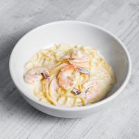 Shrimp Alfredo · Shrimp cream egg yolk over linguini