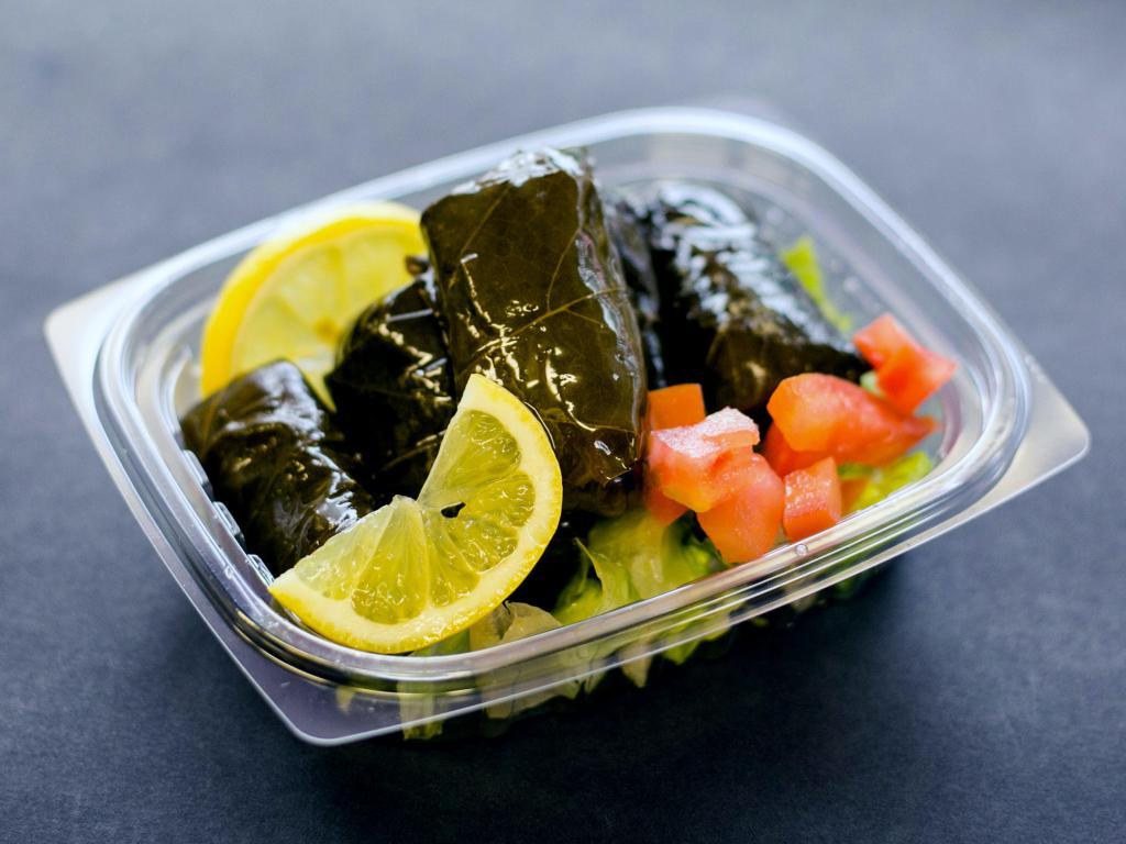 Grape Leaves (Vegetarian) · 6 Pieces Stuffed with fresh vegetables, mint, rice, lemon and special seasoning.