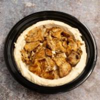 Chicken Shawerma Over Hummus · Grilled Chicken Shawerma over Hummus served with 2 pita bread