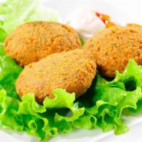 Deep Fried FALAFEL BALLS Veggie · Ground chickpeas patties blended with parsley, onions, garlic and seasonings. deep fried to ...