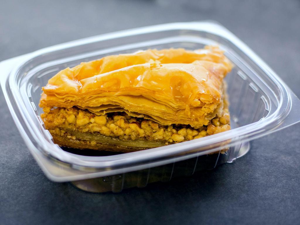 Walnuts Baklava · Sweet pastry made of layers of filo filled with chopped nuts and sweetened. All held together with syrup.