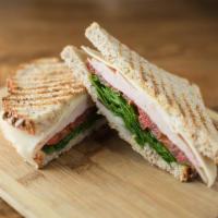 Gobble Gobble Panini · Smoked turkey, tomatoes, spinach and red onion topped with mayo and Grey Poupon then grilled...
