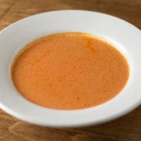 Bowl of Creamy tomato Soup · 16 oz bowl of soul with side of olive oil focaccia