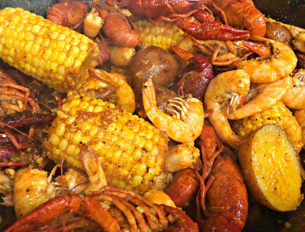 Dinner Combo #1 · Feeds 1-2 people. 1 lb. crawfish, 1 lb. shrimp, sausage about a 1/4 lb., 2 pieces potatoes, 2 pieces corn.
