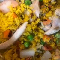 31. Young Chow Fried Rice · Pork, chicken and shrimp.
