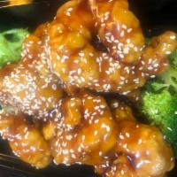 H17. Sesame Shrimp · Crispy golden tender shrimp served in mildly season sauce with broccoli and sesame. Hot and ...