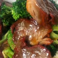 75. Roasted Pork with Broccoli · Served with your choice of rice.