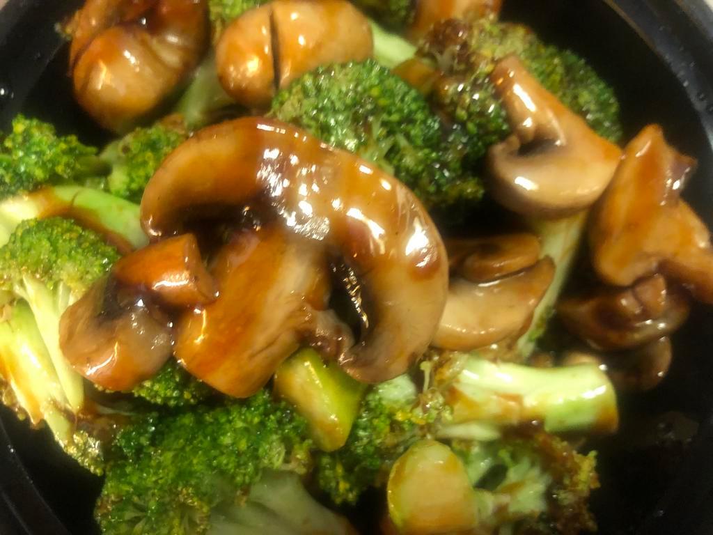 135. Broccoli with Straw Mushroom · Served with choice of rice.