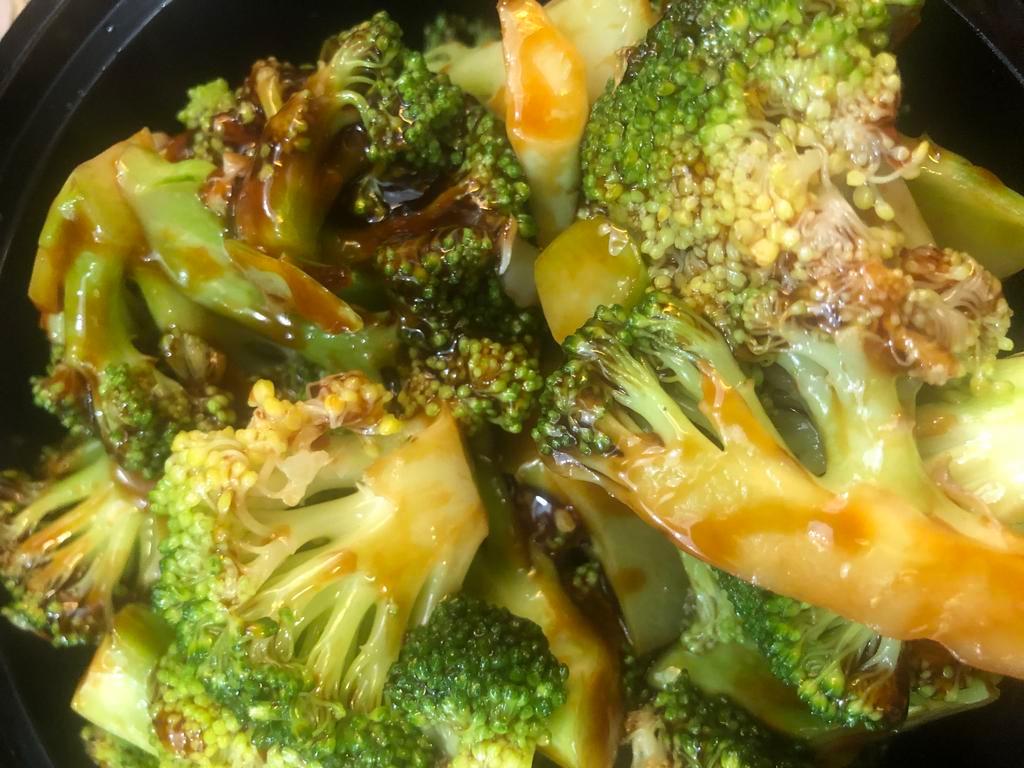 140. Sauteed Broccoli · Served with choice of rice.