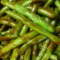 142. Sauteed String Beans · Served with choice of rice.