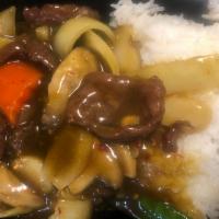 102. Curry Beef · Served with your choice of rice. Hot and spicy.