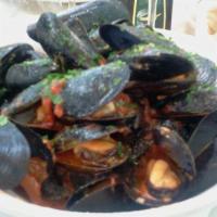 Zuppetta di Cozze · P.E.I. Mussels, cherry tomatoes, garlic, served in a spicy red or white sauce.
