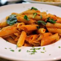 Penne Arrabbiata · Penne pasta with spicy tomato and garlic sauce.