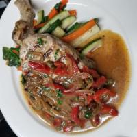 Pork chop, pizzicato sauce  · Grilled pork chop, onion, red peppers and capers in a light tomato sauce
