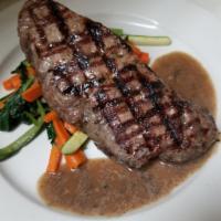 NY Strip Steak · Red Wine Mushroom Sauce, Served over Mashed Potatoes and Vegetables of the day