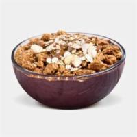 Acai Nutty Butter Bowl · Organic unsweetened açaí, chocolate whey, soy milk, peanut butter and agave. Topped with alm...