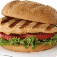 Grilled Chicken Sandwich · Boneless Chicken Marinated  and grilled ,served on a bun with Lettuce Tomatoes and your choi...