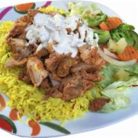 Chicken over Rice PLATTER · Grilled Chicken, Basmati Rice, Lettuce, Tomatoes with Topped with your choice of Sauce.