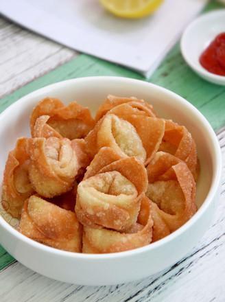 13. Fried Pork Wonton (8) · Chinese dumpling that comes with filling.