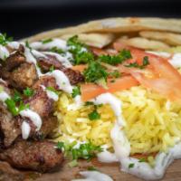Mediterranean Plate · Choice of either lamb, chicken or falafel, served with Aybla rice, tomatoes, tzatziki and a ...