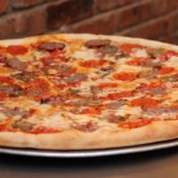 Meat Lover Pizza · Homemade tomato sauce, pepperoni, smoked bacon, sweet Italian sausage, ham, homemade meatbal...