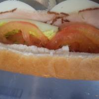 Turkey and Cheese · This sandwich has generous amounts of Turkey layered on our Canfora bread! Choose a bread to...
