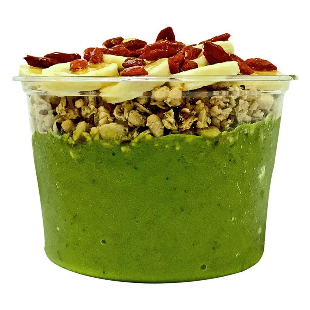 Green Bowl · Spinach, kale, pineapple, mango, banana, 100% apple juice and honey. Topping: hempseed granola, banana and  goji berries.