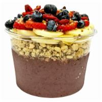 Heavenly Acai Bowl · Organic acai, almond butter, cacao, strawberries, banana, housemade cashew milk. Topping: he...