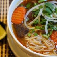14. Pho Bo Kho · Beef stew noodle soup.