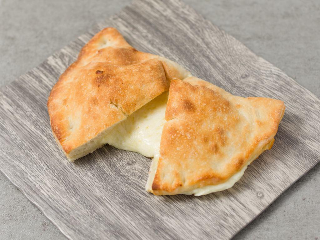 Cheese Calzone · Stuffed with ricotta and mozzarella.