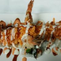 Manhattan Roll · Shrimp tempura and avocado topped with spicy crabmeat.