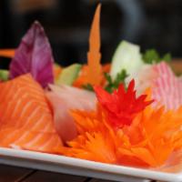 24 Piece Large Sashimi · Salmon, tuna, red snapper, yellowtail, octopus and surf clam.