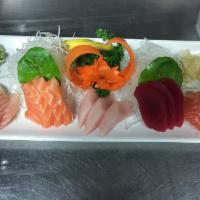 15 Piece Medium Sashimi · Salmon, tuna, red snapper and yellowtail.